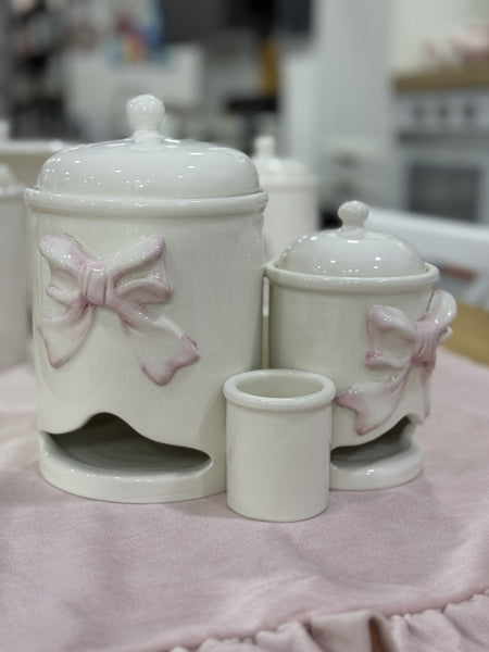 Portacialde con fiocco in porcellana di Capodimonte